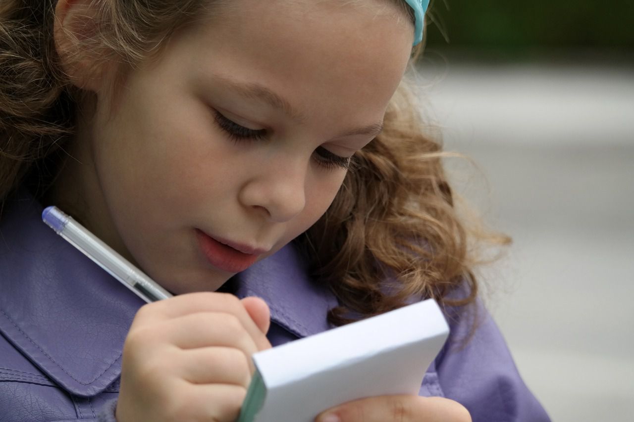 girl making notes