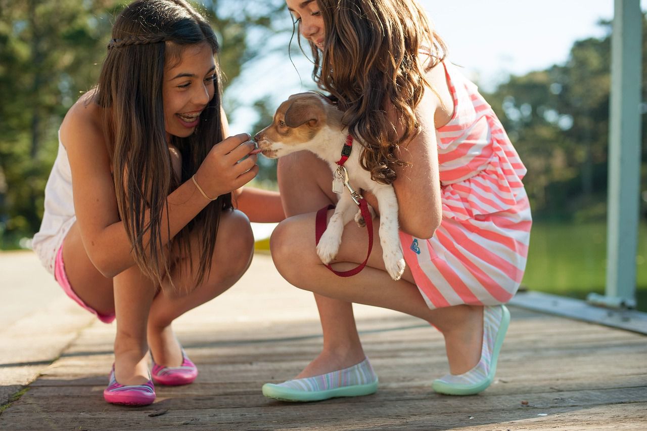 girls with a dog