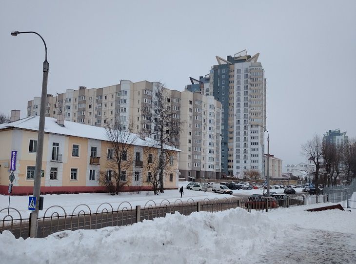 город