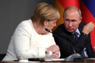 Путин и Меркель выступили за скорейшее прекращение боевых столкновений в Ливии