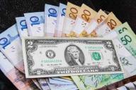 Белорусский рубль 4 июня укрепился к доллару
